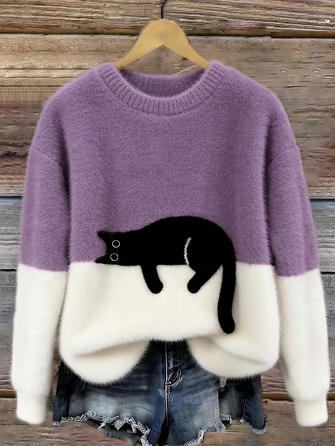 Oversize'owy sweter z nadrukiem kota