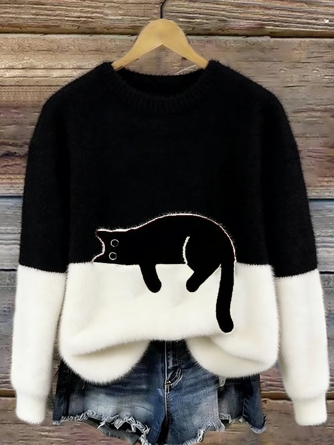 Oversize'owy sweter z nadrukiem kota