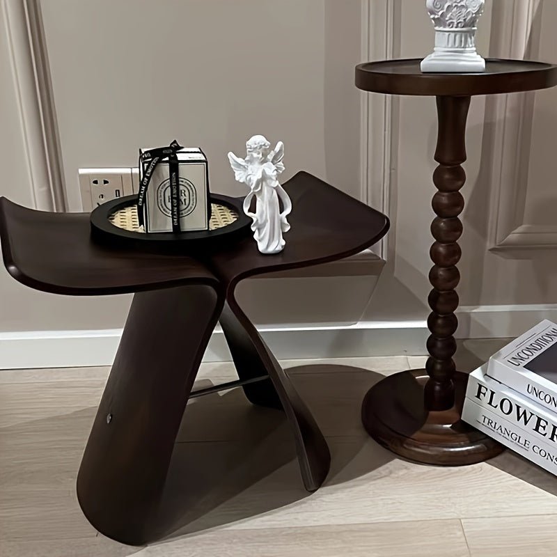 Elegancki stołek motylkowy – ponadczasowy design do salonu i przedpokoju