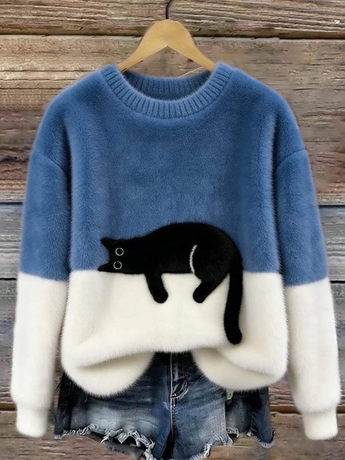Oversize'owy sweter z nadrukiem kota
