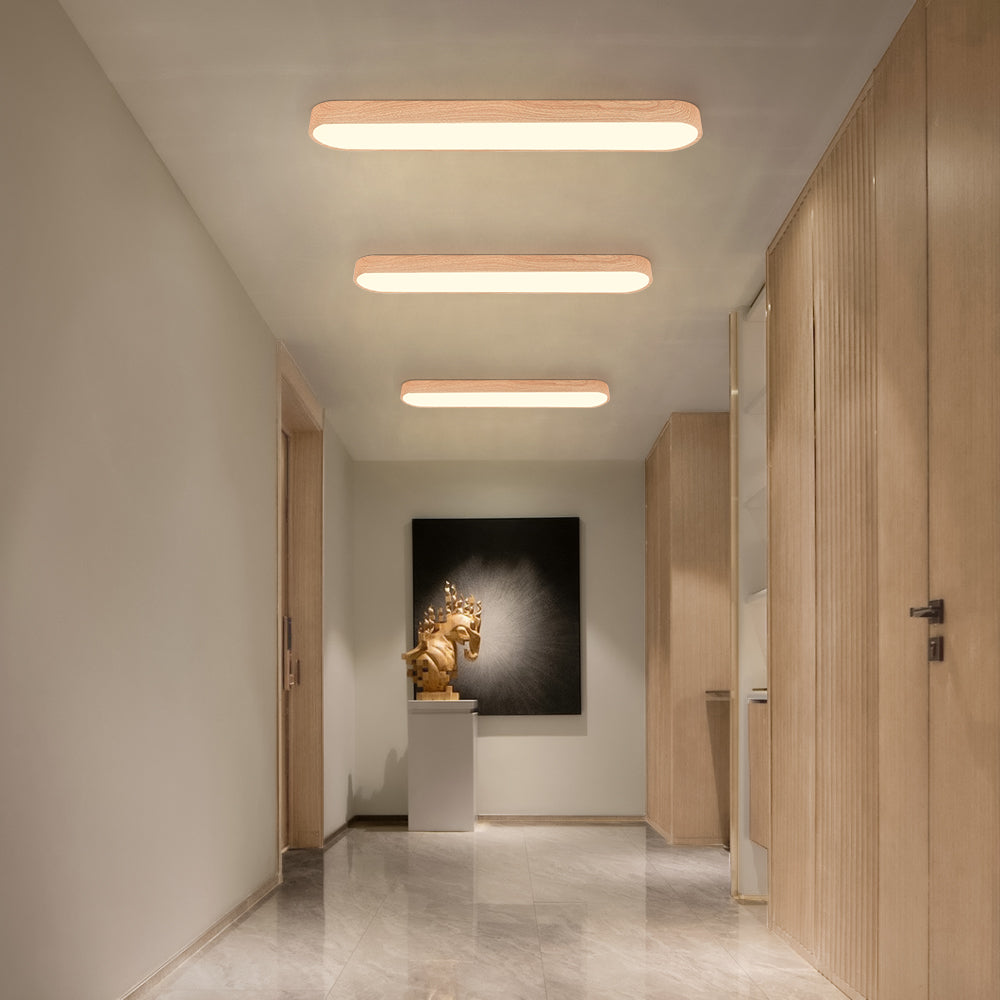 Owalny plafon LED Nordic Glow z drewnianym akcentem