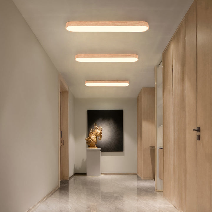 Owalny plafon LED Nordic Glow z drewnianym akcentem