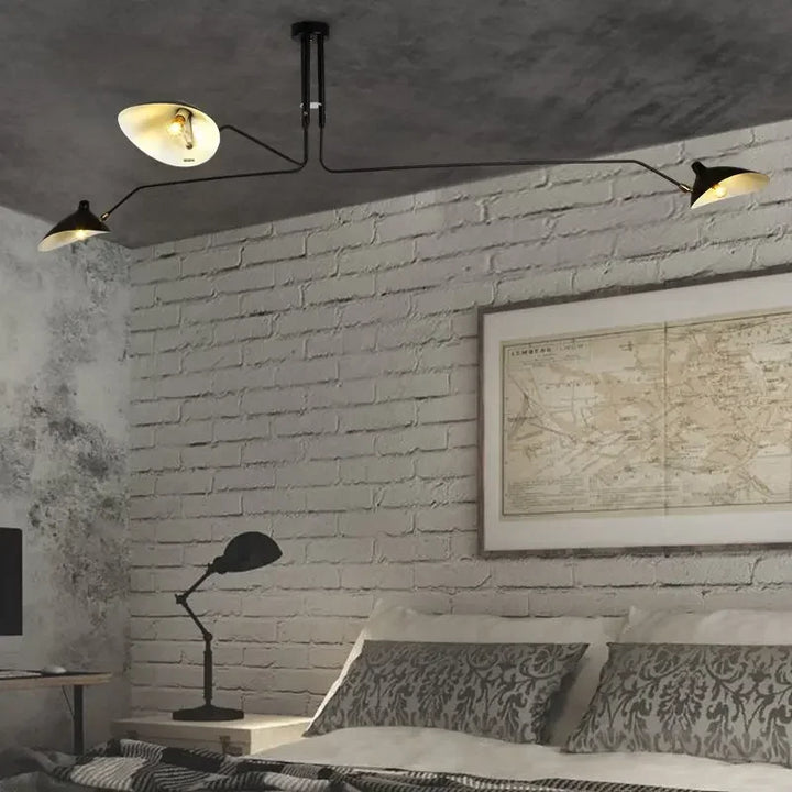 Czarna lampa sufitowa z obrotowymi ramionami – nowoczesny design