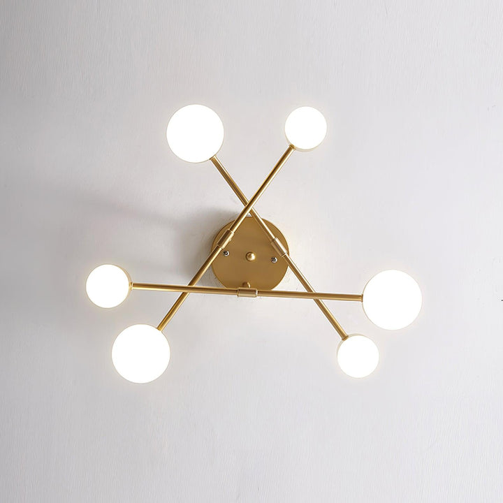 Lampa sufitowa Sputnik z krzyżującymi się ramionami i cylindrycznymi punktami świetlnymi