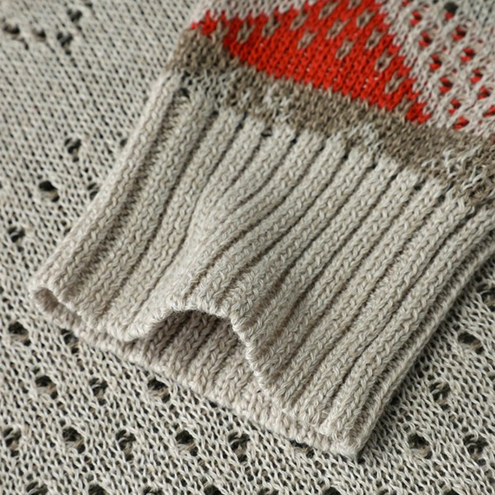 Damski sweter z geometrycznym wzorem i długim rękawem