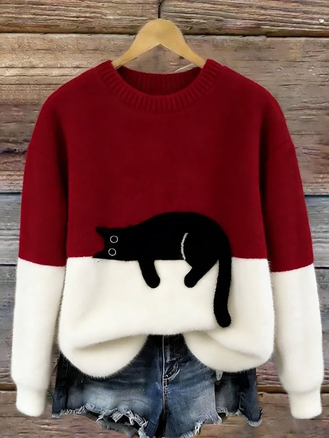 Oversize'owy sweter z nadrukiem kota