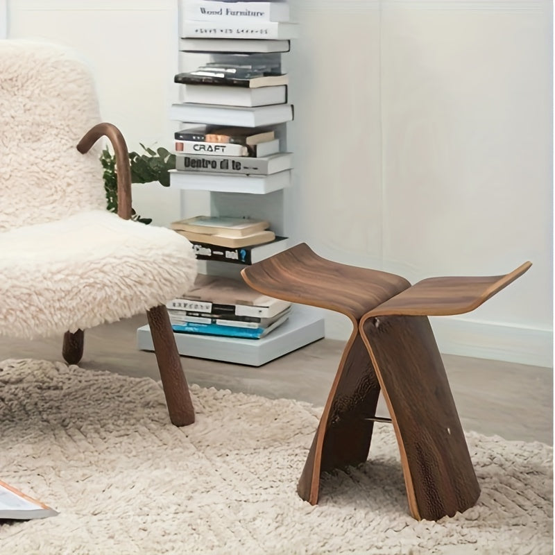 Elegancki stołek motylkowy – ponadczasowy design do salonu i przedpokoju