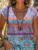 T-shirt casual z kwiatowym wzorem i dekoltem w serek