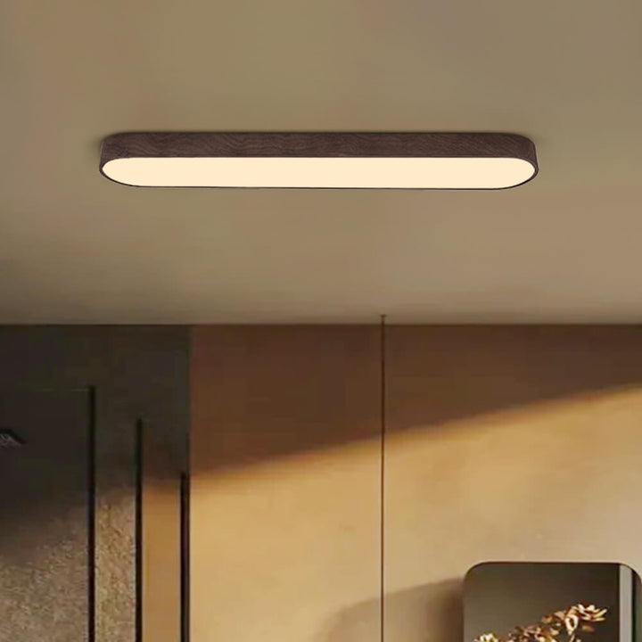 Owalny plafon LED Nordic Glow z drewnianym akcentem